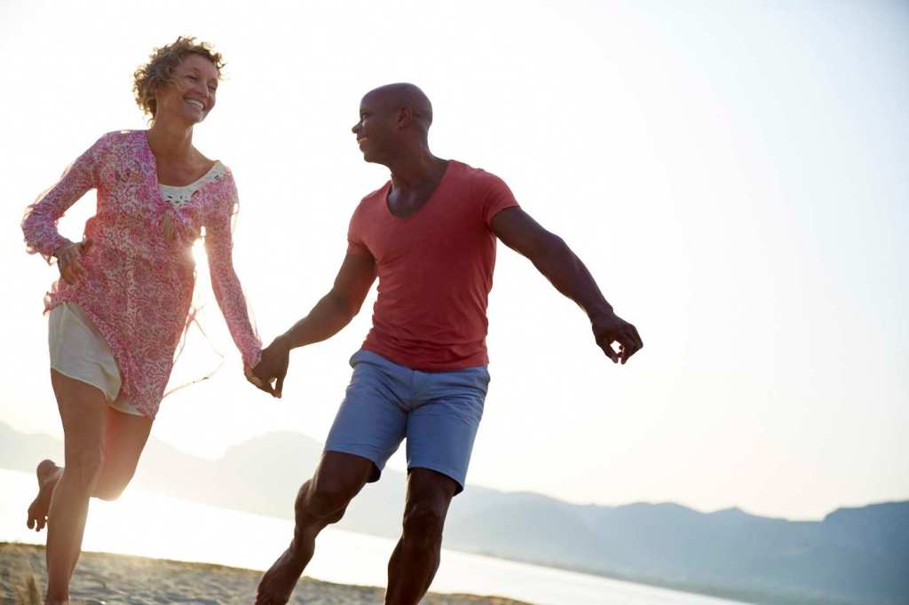 MixedRaceCouple_RunningHuggingBeach_030
